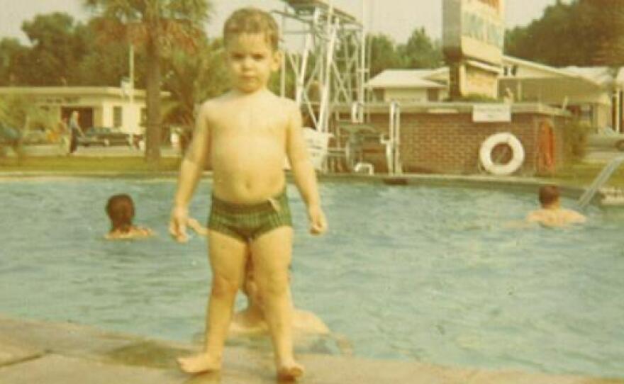 Richard a.k.a 'Little Riqui' modeling by the pool of a roadside motel on the family's drive from New York City to Miami when they moved down in 1972.