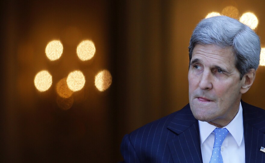 Secretary of State John Kerry leaves his hotel on the way to Mass at the St. Stephen's Cathedral in Vienna, Austria,on Sunday.