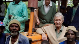 Mike Campbell (center right) and Ben Freeth (middle back) with some workers.