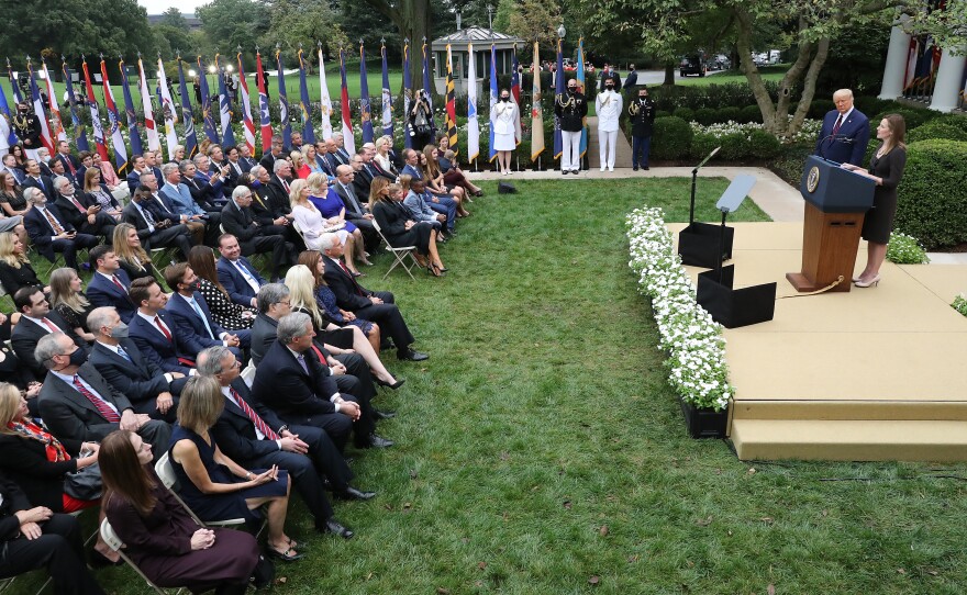 Judge Amy Coney Barrett (R) speaks after U.S. President Donald Trump announced that she will be his nominee to the Supreme Court in the Rose Garden at the White House.
