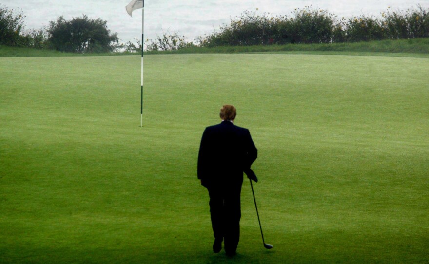 Donald Trump walks toward the 11th tee at Trump National Golf Club Los Angeles in Rancho Palos Verdes, Calif.