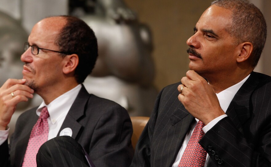 Attorney General Eric Holder (R) and Assistant Attorney General for the Civil Rights Division Thomas Perez in 2010 in Washington, D.C.