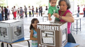Patricia Terrazas casts her ballot for the Mexican presidential election in Ciudad Juárez. She is both a Mexican citizen and a U.S. resident who lives and works in El Paso, Texas.