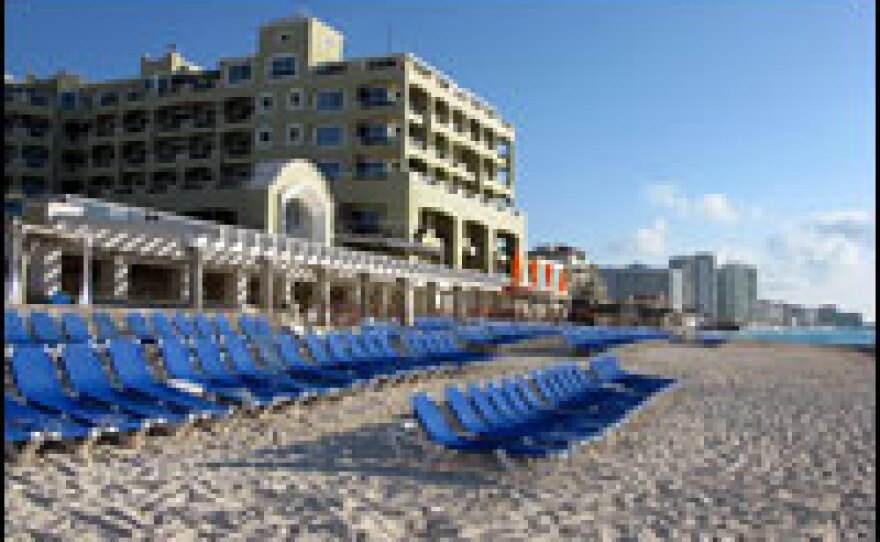 Tourists are a rare sight on the beaches of Cancun, Mexico, since the swine flu outbreak. Hotels, restaurants, bars and other attractions in Cancun are empty as nervous tourists cancelled travel plans. Officials say recovery could be months away for the tourism industry, a vital part of the national economy.