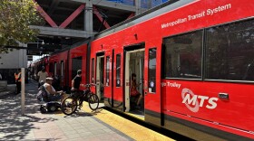 Passengers board a trolley at the 12th and Imperial Transit Center, Aug. 21, 2025.