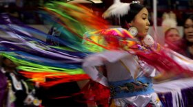 Fancy shawl dancer, Mikala SunRhodes, dances at the Denver March Powwow, Colorado.