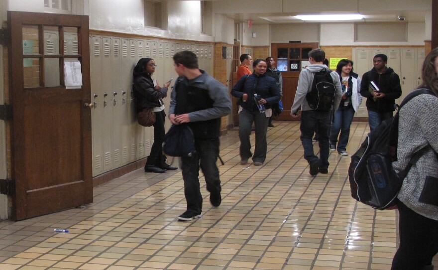 Students in Central High School walk through the hallways between classes.