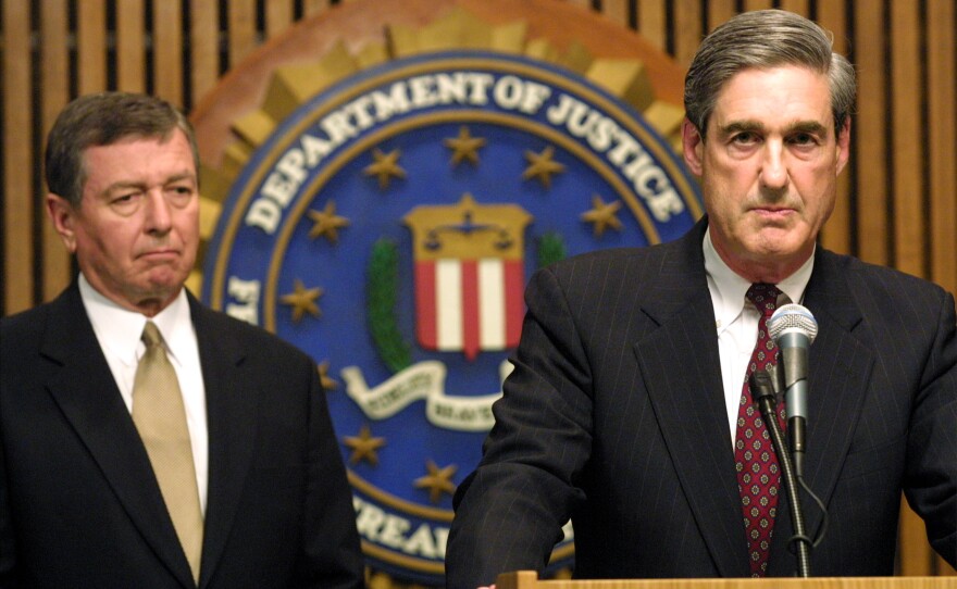 FBI Director Robert Mueller had been on the job just a week before the terrorist attacks of Sept. 11, 2001. On Sept. 12, he took questions from reporters with U.S. Attorney General John Ashcroft about the investigation.