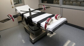 FILE - This Oct. 9, 2014, file photo shows the gurney in the execution chamber at the Oklahoma State Penitentiary in McAlester, Okla.