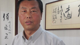 Former civil servant Wang Xiaofang is the author of 13 books on "bureaucracy literature," including <em>The Civil Servant's Notebook</em>, which recently was translated into English.