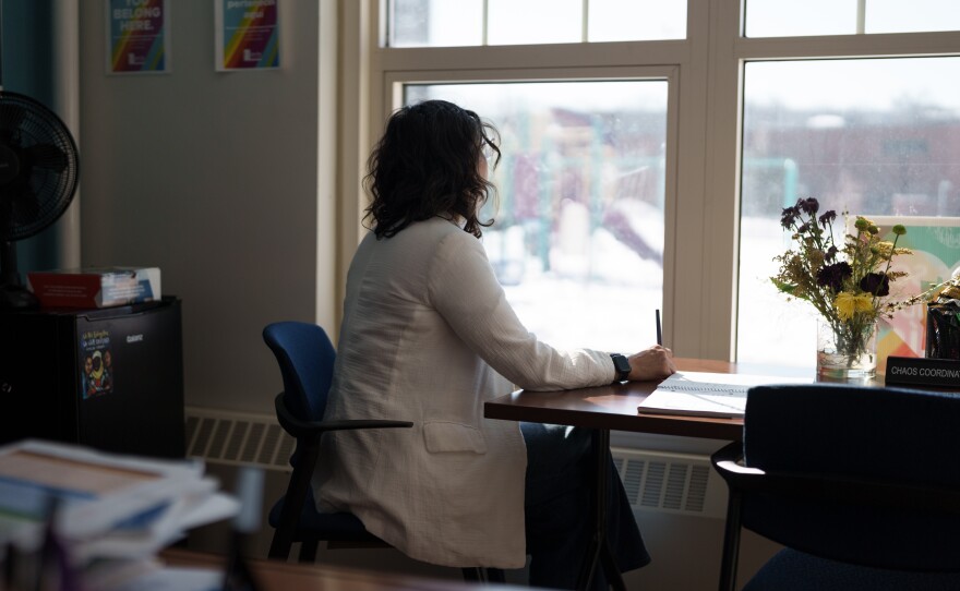 Amanda, the principal of the elementary school, sits for a portrait in her office in St. Paul, Minn., on March 18. She says many students are coming to school with heightened anxiety in the aftermath of the ICE surge.