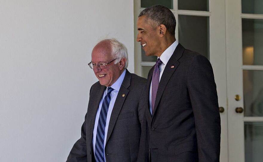 President Obama and Sen. Bernie Sanders walk to the Oval Office of the White House on Thursday.