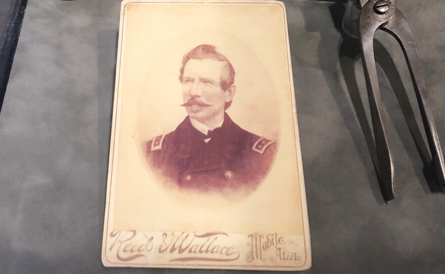 A photograph of Adm. Raphael Semmes on display with other artifacts at the History Museum of Mobile. A bronze statue of Semmes removed from prominent display in downtown Mobile has been moved to the museum where Mayor Sandy Stimpson says it can be interpreted with historical context.