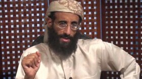 In this image taken from video and released by SITE Intelligence Group on Monday, Nov. 8, 2010, Anwar al-Awlaki speaks in a video message posted on radical websites. Al-Awlaki, the U.S.-born radical Yemeni cleric who attended San Diego State University, was killed in a U.S. drone attack in September 2011.  