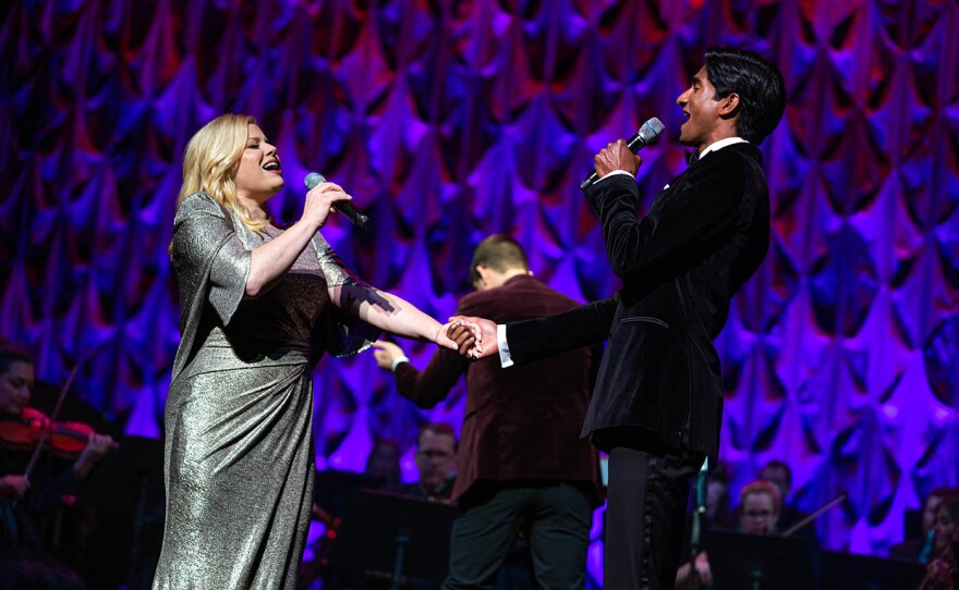 Megan Hilty and Michael Maliakel performing a duet.