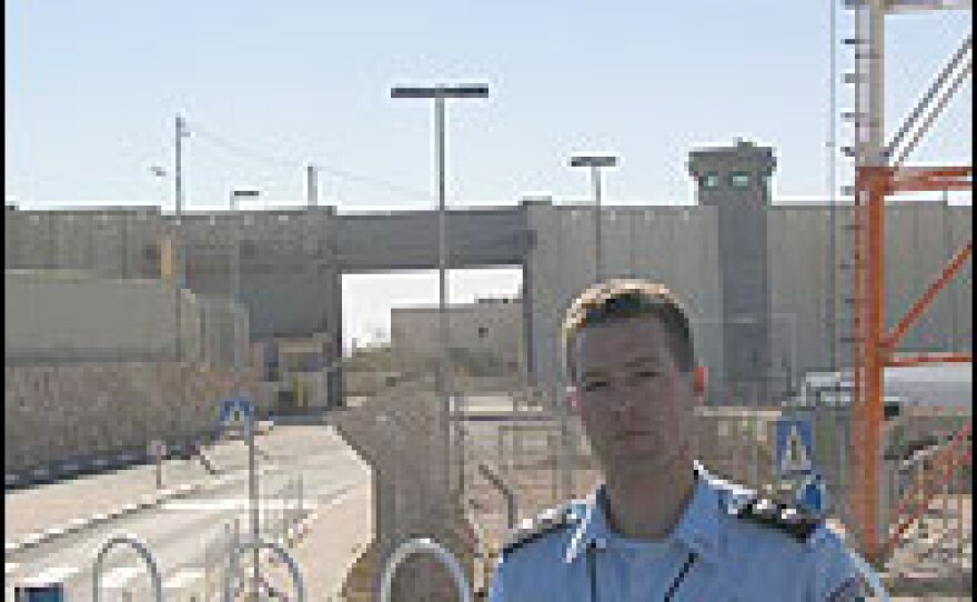 Israeli Police Inspector Micky Rosenfeld stands near the newly completed checkpoint into Bethlehem from Jerusalem.  