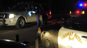 Police blocked roads Tuesday leading to the mountains near San Bernardino, Calif., where accused killer Christopher Dorner was thought to be hiding.