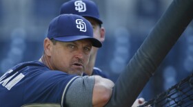 Former San Diego Padres closer Trevor Hoffman leans on the batting cage before a baseball game against the Houston Astros, April 27, 2015.