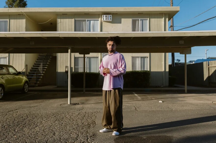 Jodeah Wilson stands for a portrait outside his apartment building near Sac State on Oct. 17, 2025.