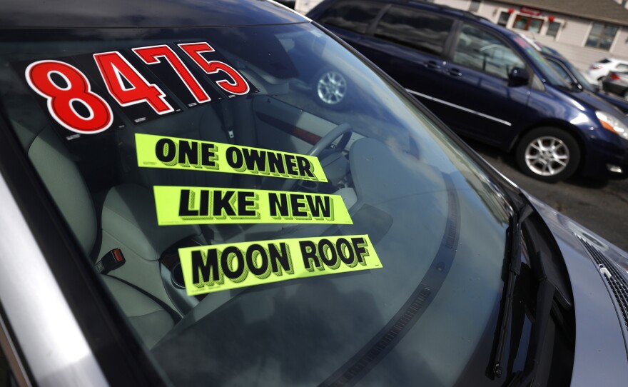 Used cars sit on the sales lot at Frank Bent's Wholesale Motors in El Cerrito, Calif., on March 15. Supply chain snarls and pent-up demand are driving up the prices of a lot of things, including new and used cars.