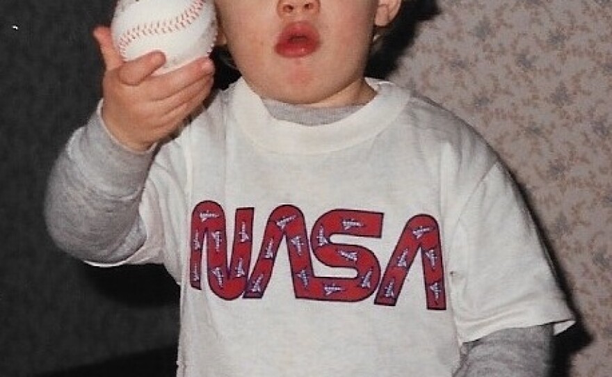 Josh plays with a baseball in 1989.