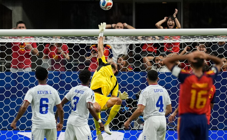 Cape Verde goalkeeper Vozinha (1) makes a save during the World Cup Group H soccer match between Spain and Cape Verde in Atlanta, Monday, June 15, 2026.