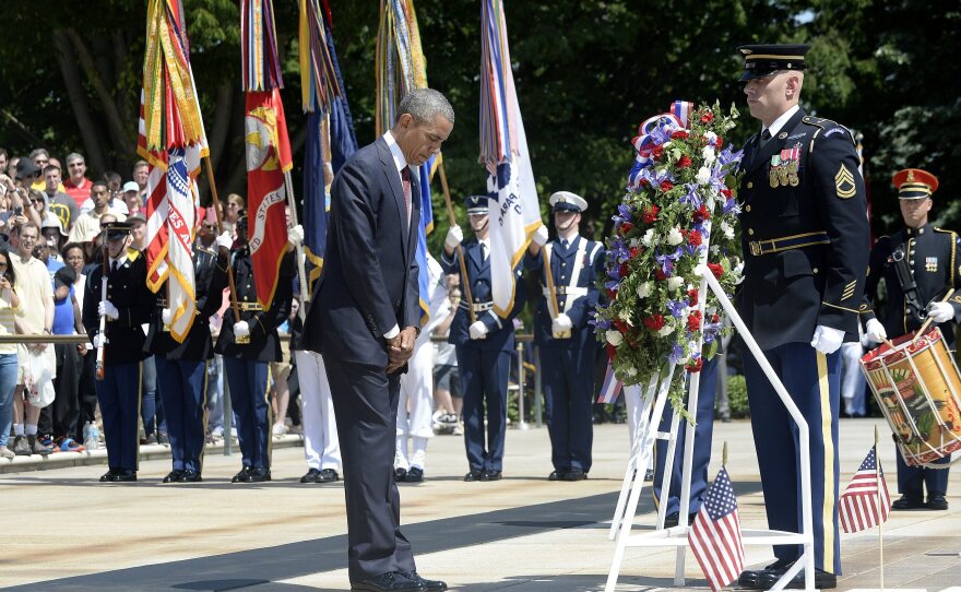 President Obama lays a wreath at the Tomb of the Unknowns in Arlington, Va.