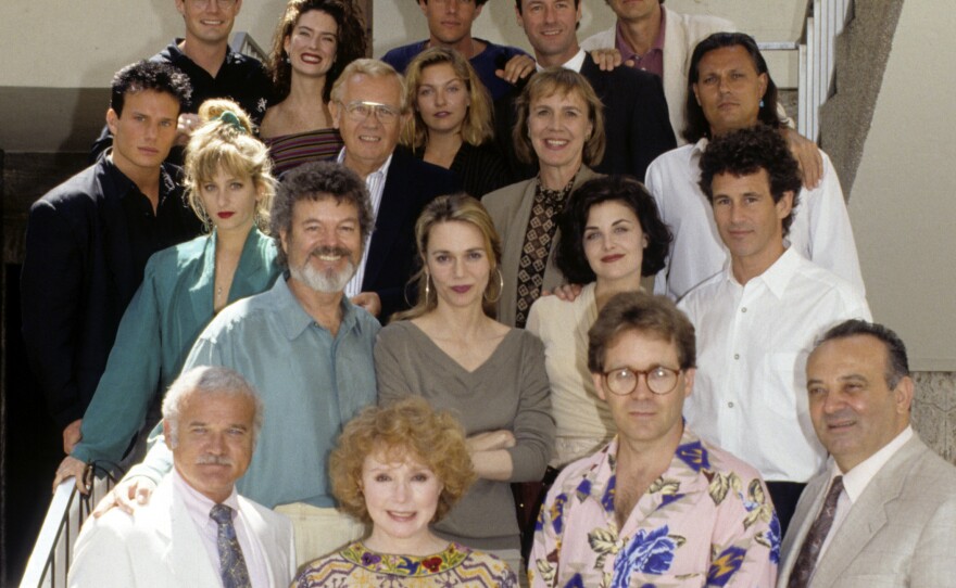 Badalamenti, bottom right, with the cast of <em>Twin Peaks</em> in a photo taken July 7, 1990.