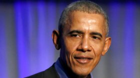 Former President Barack Obama address the participants at a summit on climate change involving mayors from around the globe in Chicago, Dec. 5, 2017. 