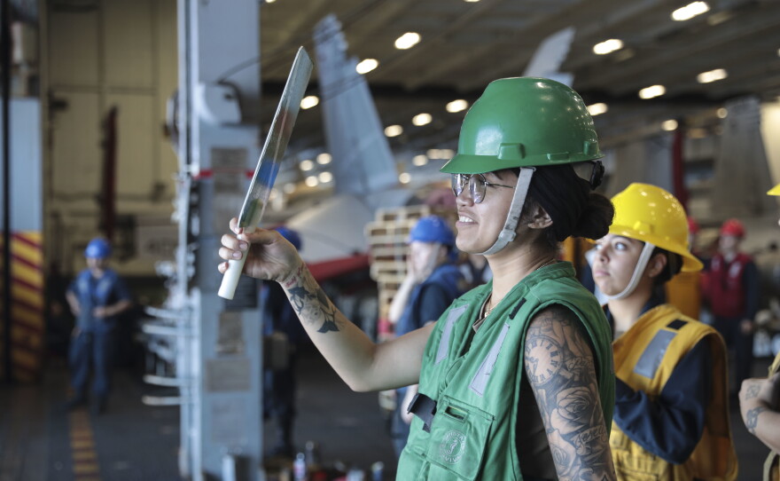 Seaman Apprentice Johnnese Poomaihealani on the aircraft carrier USS Abraham Lincoln during deployment on May 6, 2022.