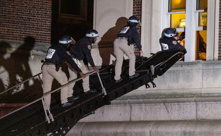 Using a tactical vehicle, New York City police enter an upper floor of Hamilton Hall on the Columbia University campus in New York, Tuesday, April 30, 2024, after the building was taken over by protesters earlier in the day.