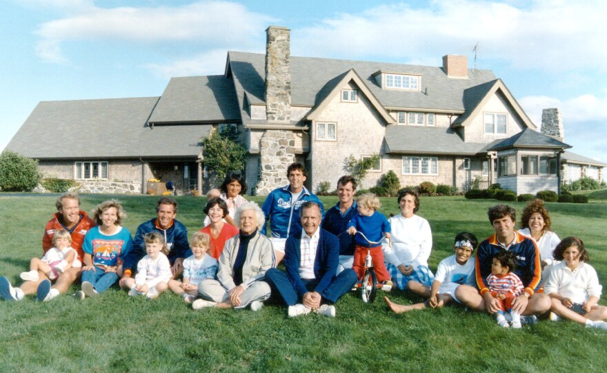 A portrait of former President George H.W. Bush and his family in front of their Kennebunkport, Maine, home in 1986.