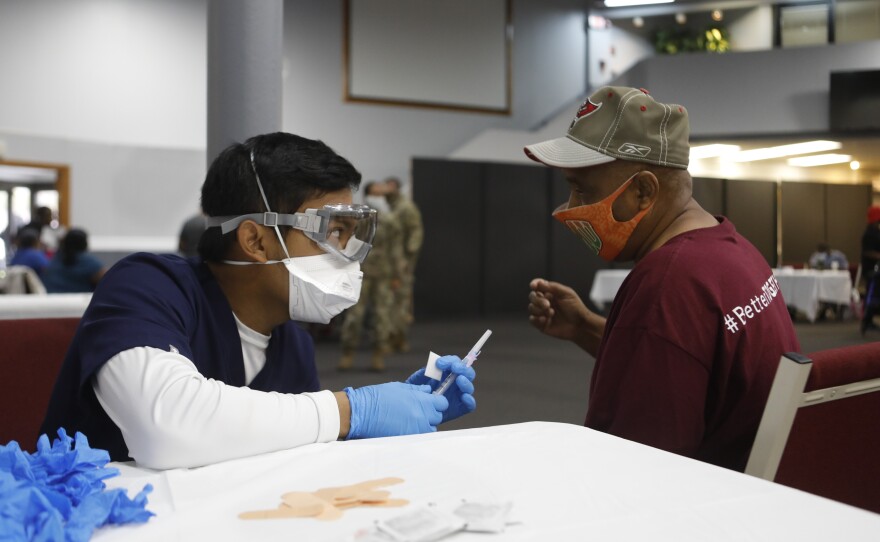 Florida's Pasco County Health Department and the Army National Guard partnered with Fellowship Church in Tampa, Fla., to help city residents age 65 and older get immunized with the Moderna COVID-19 vaccine in February.