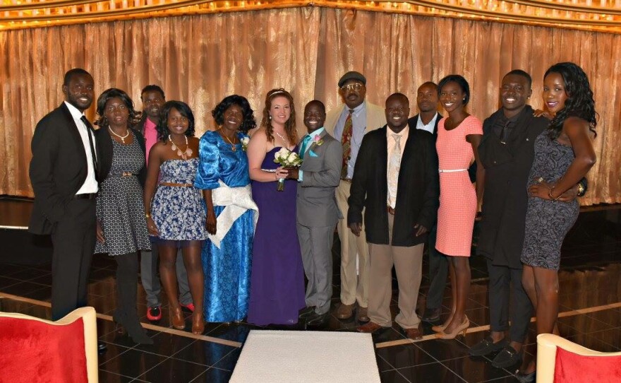 Alfred Olango (fourth from the left) poses at his brother's wedding in this undated photo.