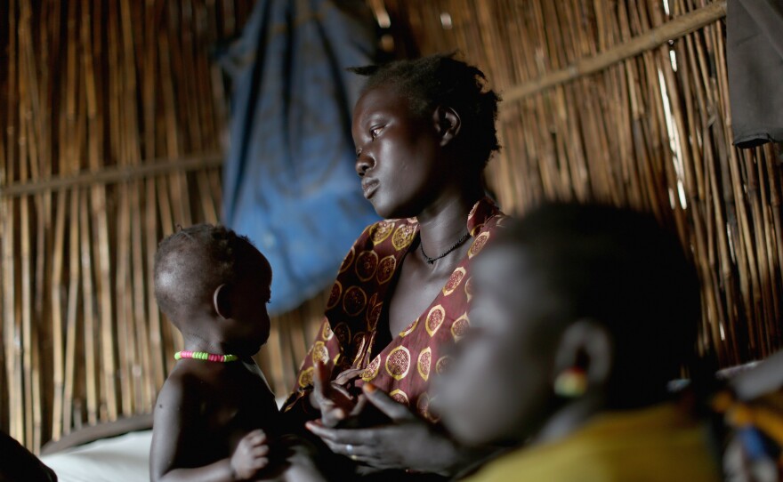 Tavitha Nyaluk, 26, has lived in the U.N. Protection of Civilians site near Bentiu for two years. She came because she was afraid soldiers might attack her family. Now she is afraid to leave, worried she wouldn't be able to feed her children.