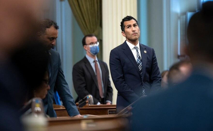 Democratic Assemblymember Robert Rivas, right, on the Assembly floor on May 31, 2022. 