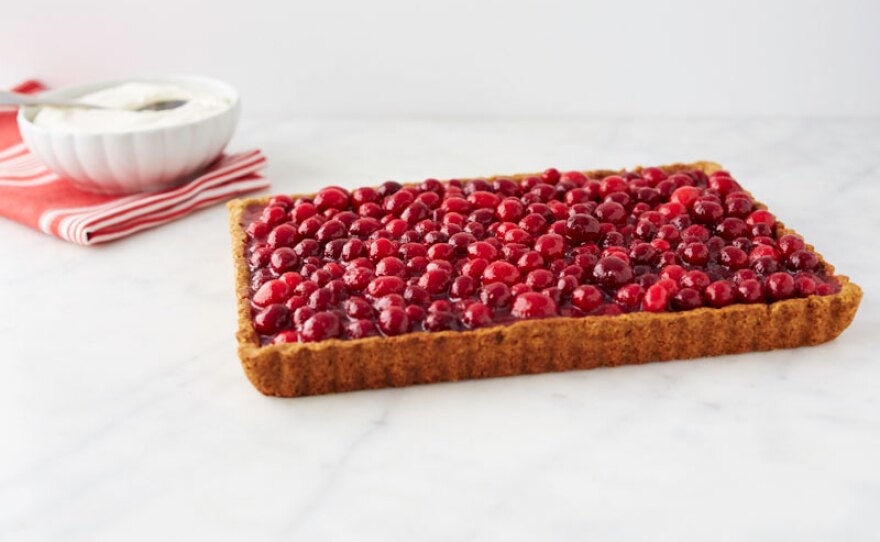 Martha uses cranberries in a jewel-like tart with an easy press-in walnut crust.