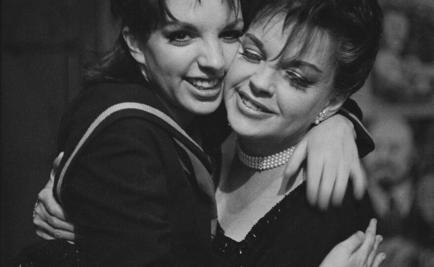 American actress and singer Liza Minnelli with her mother, American actress and singer Judy Garland, backstage at the Alvin Theatre in New York City in 1965.