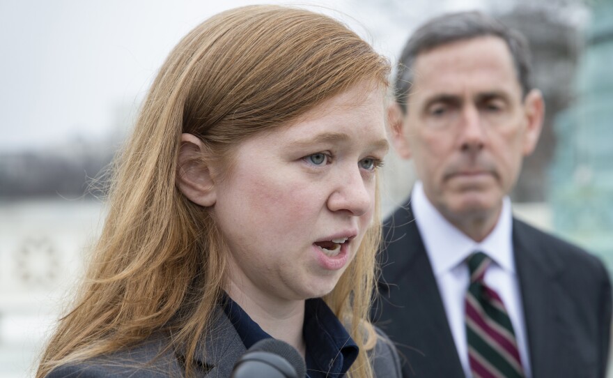 Abigail Fisher, who challenged the use of race in college admissions, speaks to reporters outside the Supreme Court on Dec. 9, 2015. The Supreme Court upheld the University of Texas' affirmative action program in a 4-3 decision.