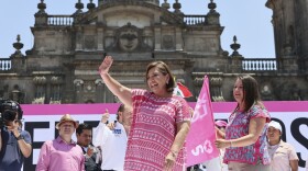Mexican presidential candidate Xochitl Galvez speaks at an opposition rally to encourage voting ahead of the June 2 presidential elections, at the Zocalo, Mexico City's main square, Sunday, May 19, 2024. (AP Photo/Ginnette Riquelme)
