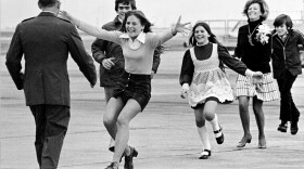 Released prisoner of war Lt. Col. Robert L. Stirm is greeted by his family at Travis Air Force Base in Fairfield, Calif., as he returns home from the Vietnam War, March 17, 1973.