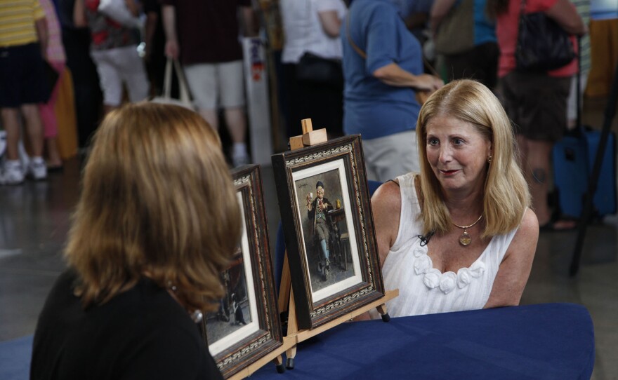 Robin Starr (left) appraises early 20th-century Eugenio Zampighi paintings in Phoenix, Ariz. ANTIQUES ROADSHOW “Vintage Phoenix 2025, Hour 1” airs Monday, October 13 at 8/7C PM on PBS.