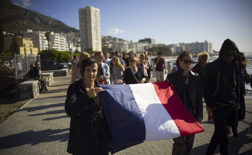 Hundreds of members of the French community and supporters take part in the "March of Defiance" in Cape Town, South Africa.