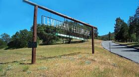 Lemurian sign visible from the road in Ramona.