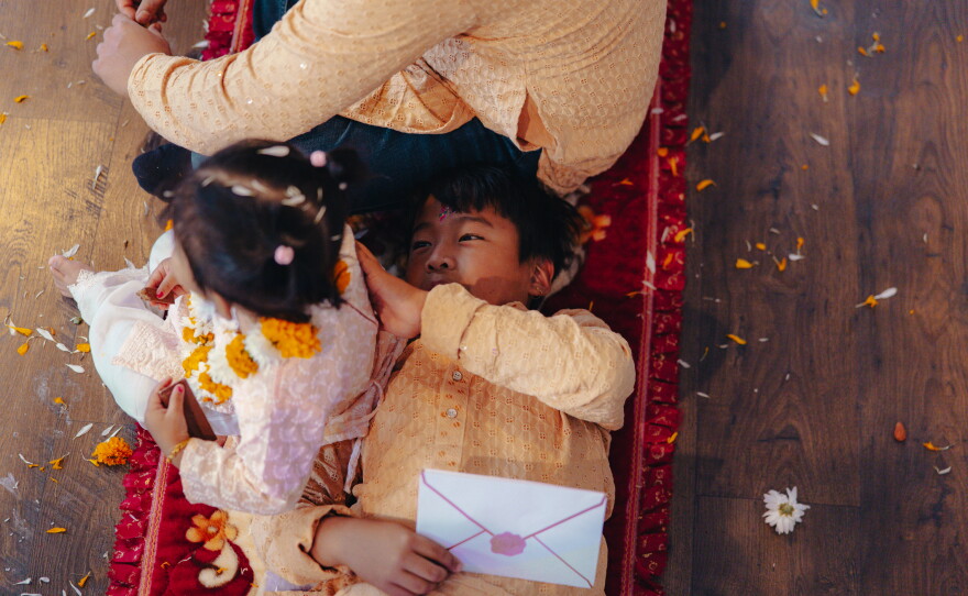 ARU's Soccer for Success head coach, Shabin Subba, hosts young siblings Bianka and Bryan Gurung at his family's home amid festivities in honor of Tihar, the Hindu festival of lights and animals, in Mount Holly Springs, Pa., on Oct. 23, 2025.