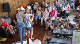Sarah Reeves, 19, dances the schottische with Ryder Cude, 15.