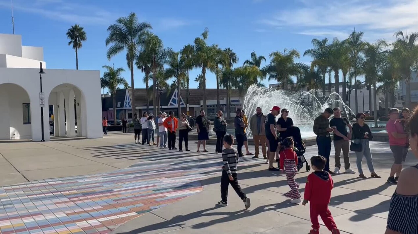 Voters wait in line to vote outside of a polling center in the afternoon on Election Day on Nov. 5, 2024 in Oceanside, Calif.