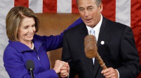 Newly minted Speaker of the House John Boehner (R-OH) receives the speaker's gavel from outgoing speaker Nancy Pelosi (D-CA).