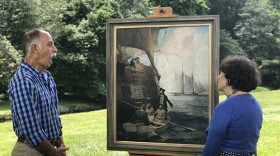 Debra Force (right) appraises a 1923 Frank Schoonover oil painting at Winterthur Museum, Garden & Library.  