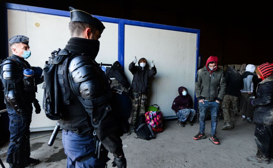 Police break up a rave in Lieuron in northwestern France. Some 2,500 partygoers attended an illegal New Year rave, violently clashing with police who failed to stop it and sparking concern the underground event could spread the coronavirus.